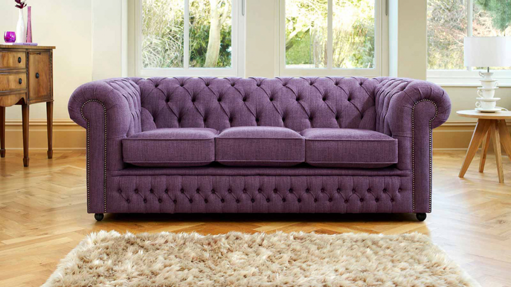 Фиолетовый диван из велюра